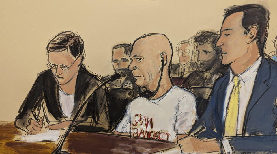 In this courtroom sketch, retired Maj. Gen. Hugo Carvajal, center, a former Venezuelan spymaster close to the country's late leader Hugo Chavez, is flanked by defense attorney Tess Cohen, left, and defense attorney Zachary Margulis-Ohnuma in federal court, Thursday, July 20, 2023, in New York. Carvajal was extradited to New York from Spain on Wednesday to face decade-old drug trafficking charges. (Elizabeth Williams via AP)