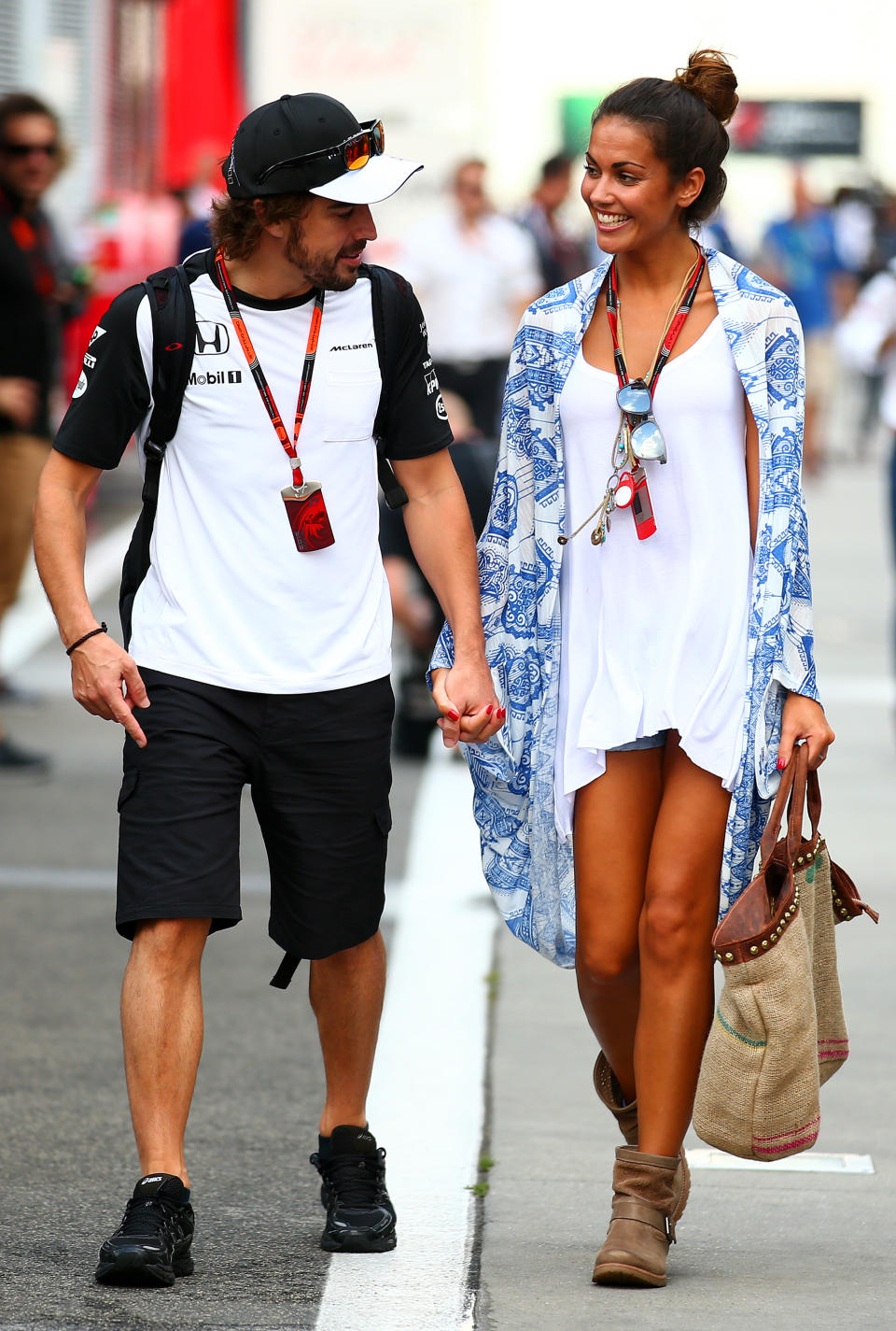 BUDAPEST, HUNGARY - JULY 25:  Fernando Alonso of Spain and McLaren Honda and his girlfriend Lara Alvarez walk in the paddock after qualifying for the Formula One Grand Prix of Hungary at Hungaroring on July 25, 2015 in Budapest, Hungary.  (Photo by Mark Thompson/Getty Images)