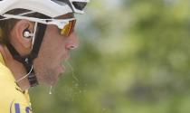 Race leader Astana team rider Vincenzo Nibali of Italy cycles to win the 145.5km 18th stage of the Tour de France cycling race between Pau and Hautacam, July 24, 2014. REUTERS/Christian Hartmann