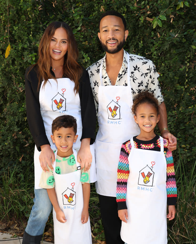 LOS ANGELES, CALIFORNIA - NOVEMBER 12: Chrissy Teigen and John Legend with son Miles and daughter Luna as John partners with Ronald McDonald House Charities (RMHC) For The Season Of Giving at Ronald McDonald House Charities on November 12, 2023 in Los Angeles, California. (Photo by Jerritt Clark/Getty Images for RMHC )