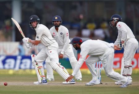 Cricket - India v New Zealand - First Test cricket match - Green Park Stadium, Kanpur - 26/09/2016. New Zealand's Mitchell Santner plays a shot. REUTERS/Danish Siddiqui