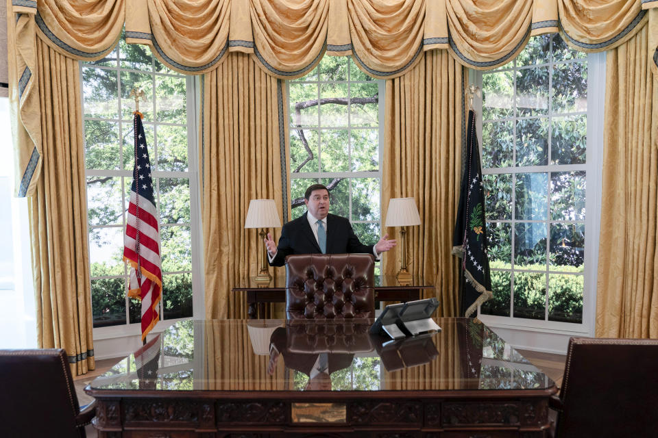 White House Historical Association President Stewart McLaurin tour members of the media in a replica of the Oval Office as is today, shown at The People's House exhibit, Monday, Sept. 16, 2024 in Washington. (AP Photo/Jose Luis Magana)