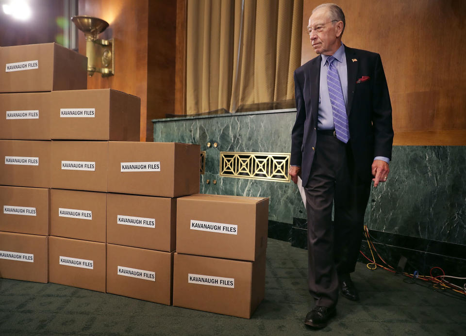 Senate Judiciary Committee Chairman Chuck Grassley (R-Iowa) walks out from behind a wall of empty boxes labeled 'Kavanaugh Files' during a news conference about Supreme Court nominee Judge Brett Kavanaugh. (Photo: Chip Somodevilla via Getty Images)