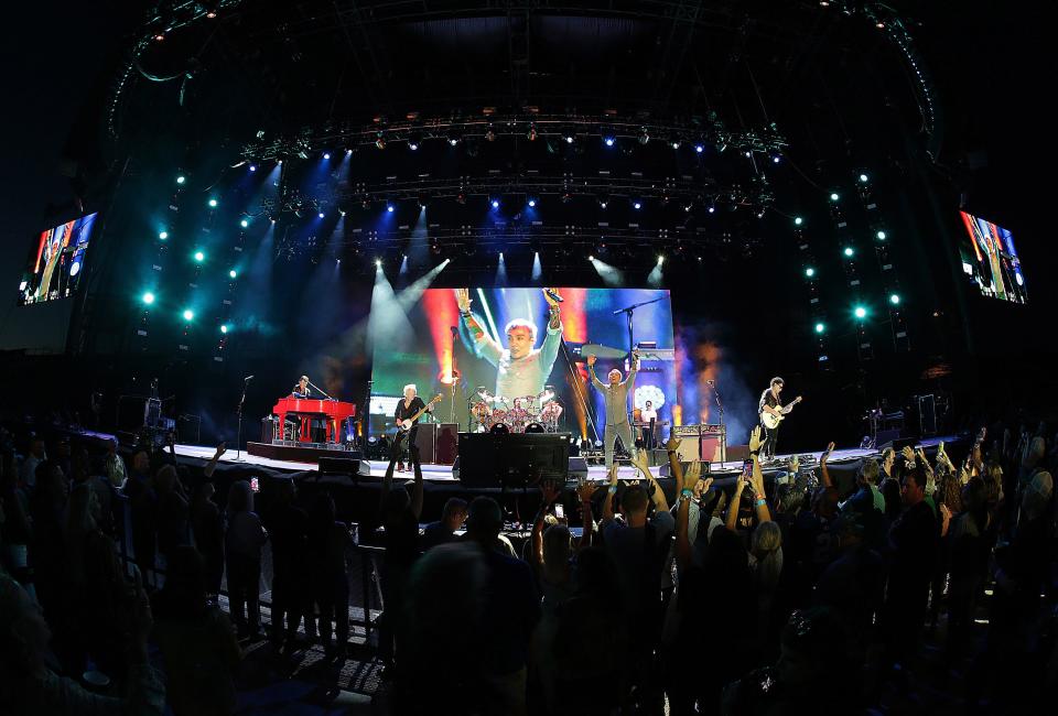 Journey performs last year at the Concert for Legends at Tom Benson Hall of Fame Stadium.