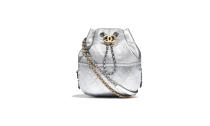 <p>Gabrielle purse, $3,400, for retail information visit <a rel="nofollow noopener" href="http://www.chanel.com/en_US/fashion/products/handbags/g/s.-chanel-s-gabrielle-purse-metallic.17K.A98787Y8220745002.c.17K.html" target="_blank" data-ylk="slk:chanel.com;elm:context_link;itc:0;sec:content-canvas" class="link ">chanel.com</a> </p>