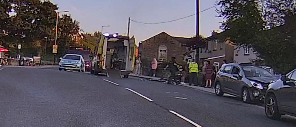 Dashcam footage shows paramedics at the scene