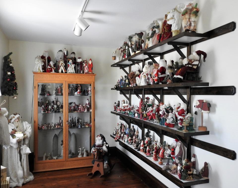 A room of Santa Claus figurines is new this year to the Festival of Trees at the Walhonding Valley Historical Society Museum in Warsaw.