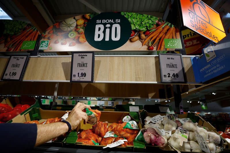 Customers shop in a Lidl supermarket near Nice