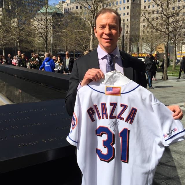 Ken Goldin at the 9/11 Memorial in New York City in April 2016, displaying jersey worn by Mike Piazza in the first Mets home game after 9/11. (Credit: Ken Goldin)