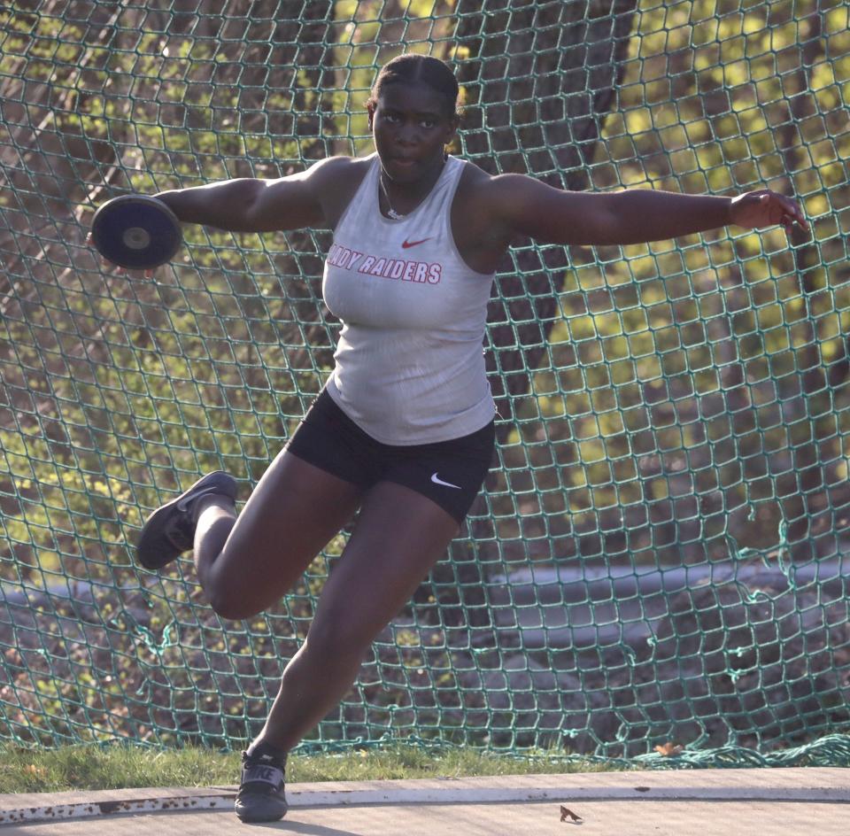 North Rockland's Deborah Estabine prepares to release the discus en route to winning the event during the Mountie Madness track and field meet at Suffern Middle School. More than 2,000 athletes competed. Estabine was a double winner, also taking girls shot put.