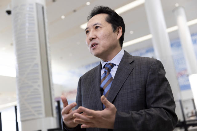 Transportation Security Administration's Identity Management Capabilities Manager Jason Lim discusses TSA's new facial recognition technology during an interview with The Associated Press at a Baltimore-Washington International Thurgood Marshall Airport security checkpoint, Wednesday, April 26, 2023, in Glen Burnie, Md. (AP Photo/Julia Nikhinson)