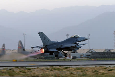 A U.S. Air Force F-16 Fighting Falcon aircraft takes off for a nighttime mission at Bagram Airfield, Afghanistan, August 22, 2017. REUTERS/Josh Smith