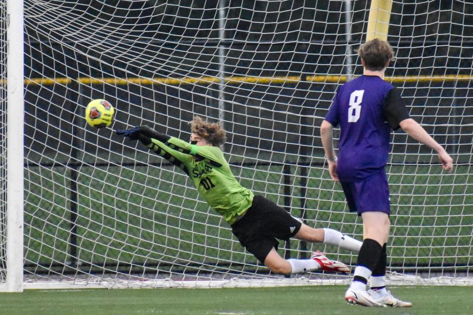 East Stroudsburg South goalkeeper Collin McAllister dives for a save against Pleasant Valley in East Stroudsburg on Wednesday, Oct. 6, 2021. McAllister kept a clean sheet in South's 3-0 win over PV.