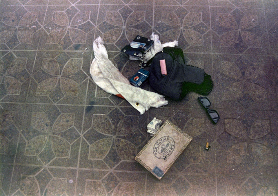 This April 1994 photo provided by the Seattle Police Department shows items found at the scene of Kurt Cobain's suicide, in Seattle. The image has never before been released. Police spokeswoman Renee Witt said Thursday, March 20, 2014, that several rolls of undeveloped film were found when a detective re-examined the Cobain case recently. (AP Photo/Seattle Police Department)