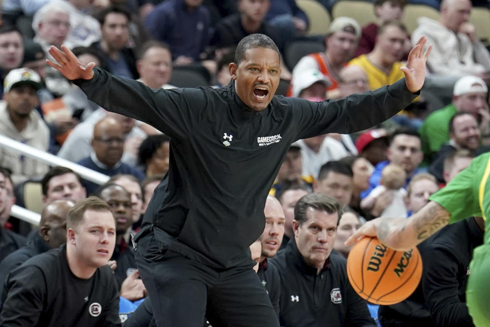 South Carolina head coach Lamont Paris calls out to his team during the first half of a first-round college basketball game against Oregon in the NCAA Tournament Thursday, March 21, 2024, in Pittsburgh. (AP Photo/Matt Freed)