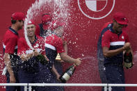 Team USA players celebrate after the Ryder Cup matches at the Whistling Straits Golf Course Sunday, Sept. 26, 2021, in Sheboygan, Wis. (AP Photo/Ashley Landis)