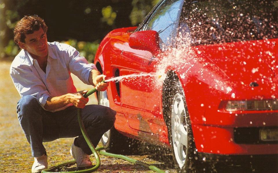 Ayrton Senna washes his Honda NSX