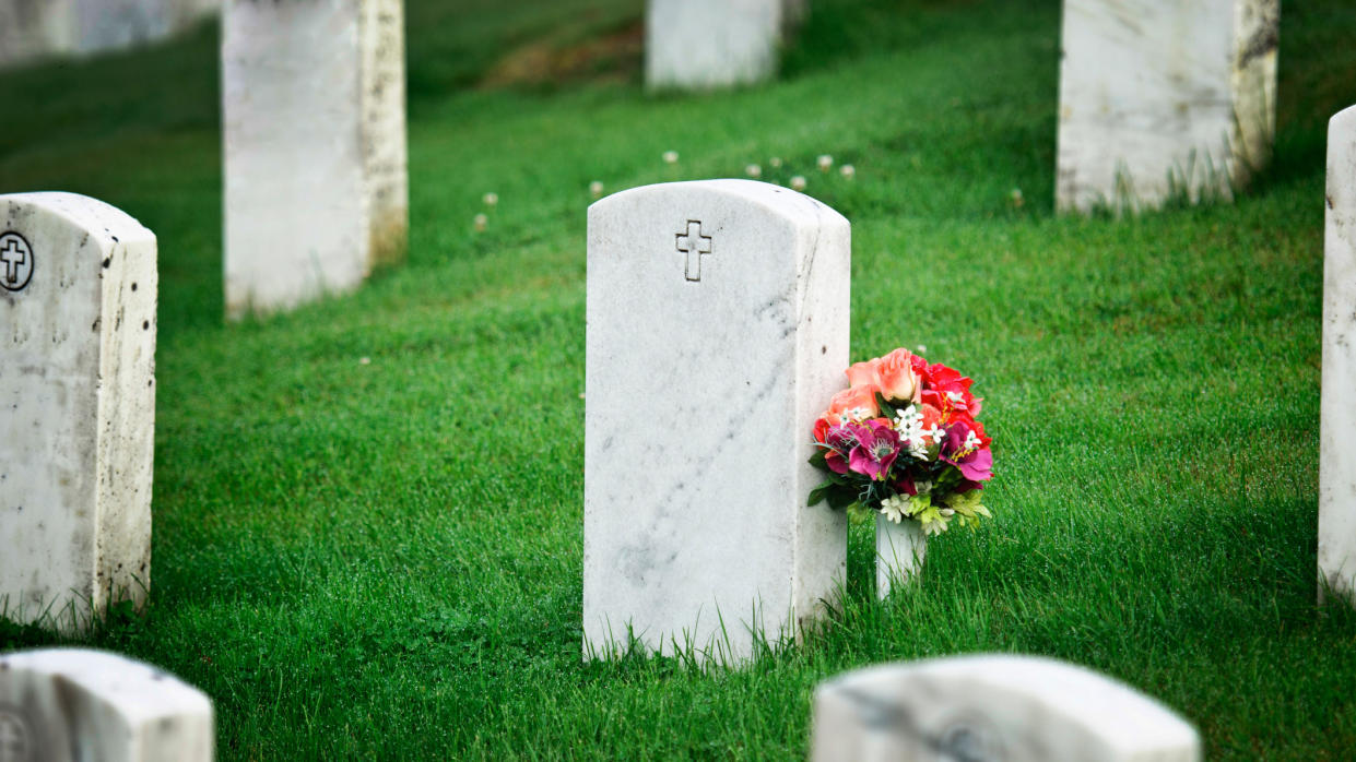 tombstone with flowers