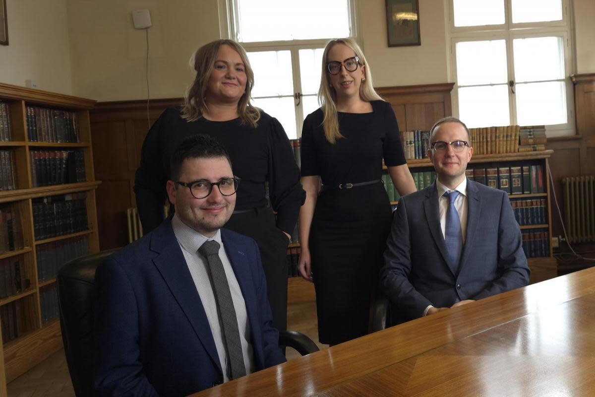 William Watkins, Leah Thomas, Ashleigh Hill and Jamie Beese, who have all received promotions with Harding Evans. <i>(Image: Harding Evans Solicitors)</i>