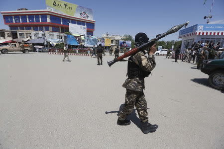 Afghan security forces patrol at the Kunduz, Afghanistan April 30, 2015. REUTERS/Omar Sobhani/Files