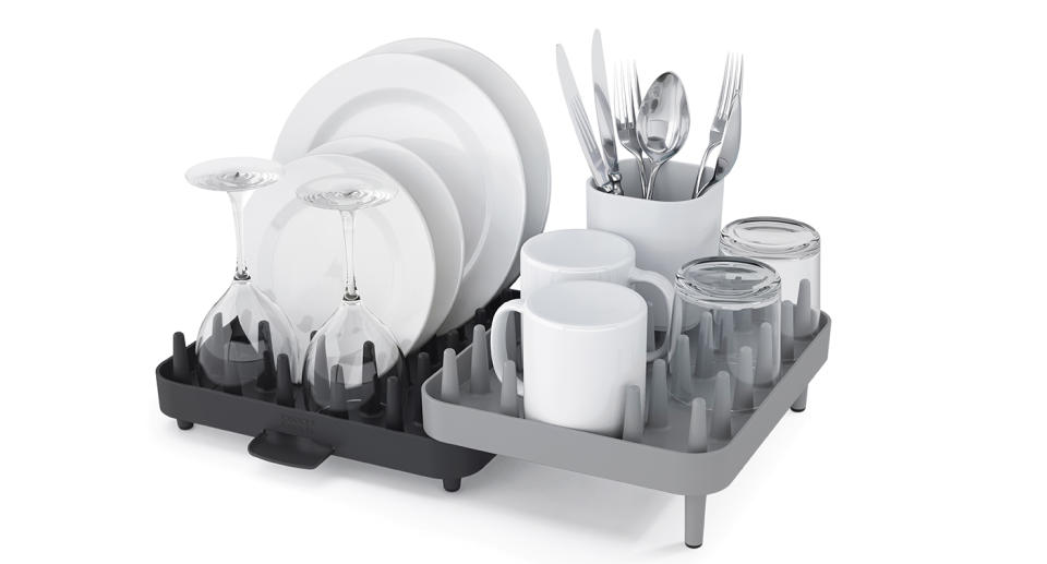 The dish rack comes in two colourways: white and green or grey and black. (Joseph Joseph)