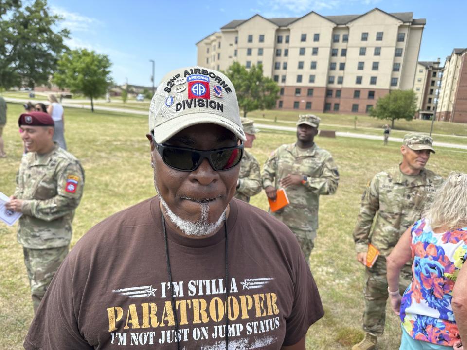 Gregory Patterson, a veteran of the U.S. Army's 82nd Airborne Division, awaits the start of the All American Hall of Fame Induction Ceremony at the military base then called Fort Bragg, on Wednesday, May 24, 2023, in Fort Bragg, N.C. Fort Bragg shed its Confederate namesake Friday, June 1, 2023, to become Fort Liberty. Patterson, 64, who served in the Army from 1977 to 1999 said, “I’m still gonna call it Bragg, even though the person that they named it after wasn’t a good person." (AP Photo/Michelle R. Smith)