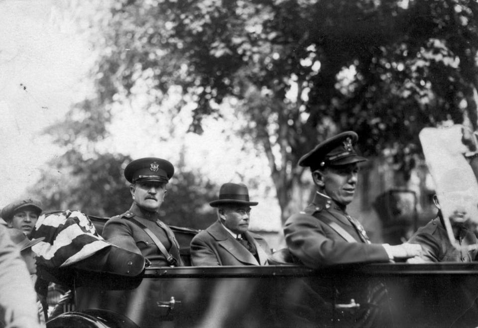 Gen. John J. Pershing and Passaic School Board President Robert Dix Benson, (backseat) and Lt. George Marshall (front seat), eventually named secretary of state, dedicate Passaic's cenotaph on Memorial Day 1924.