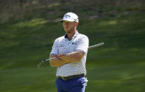 Talor Gooch looks on as he waits to putt on the fourth green during the second round of the LIV Golf Invitational-Boston tournament, Saturday, Sept. 3, 2022, in Bolton, Mass. (AP Photo/Mary Schwalm)