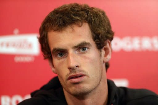 Andy Murray of Scotland talks to the media after withdrawing due to injury from the Rogers Cup Presented By National Bank at Rexall Centre at York University in Toronto, Ontario, Canada