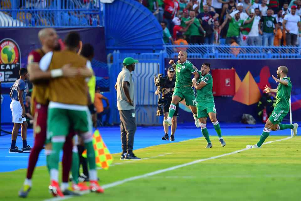 Algeria's midfielder Sofiane Feghouli (3rd-R) celebrates after scoring a goal during the 2019 Africa Cup of Nations (CAN) quarter final football match between Ivory Coast and Algeria at the Suez stadium in Suez on July 11, 2019. (Photo by Giuseppe CACACE / AFP)        (Photo credit should read GIUSEPPE CACACE/AFP/Getty Images)