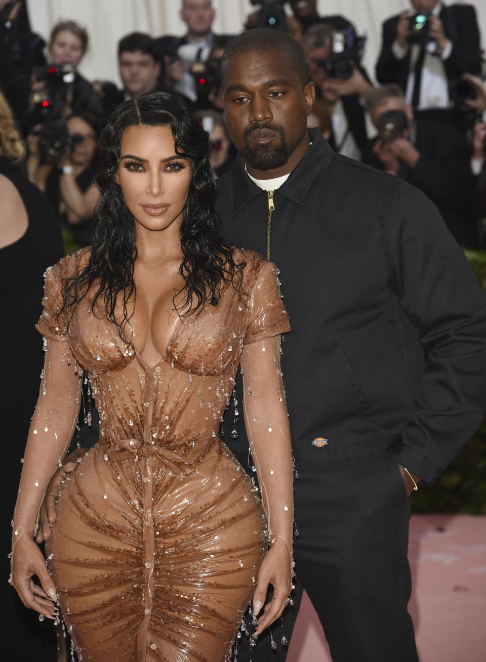 Kim Kardashian, left, and Kanye West attend The Metropolitan Museum of Art&#39;s Costume Institute benefit gala celebrating the opening of the 