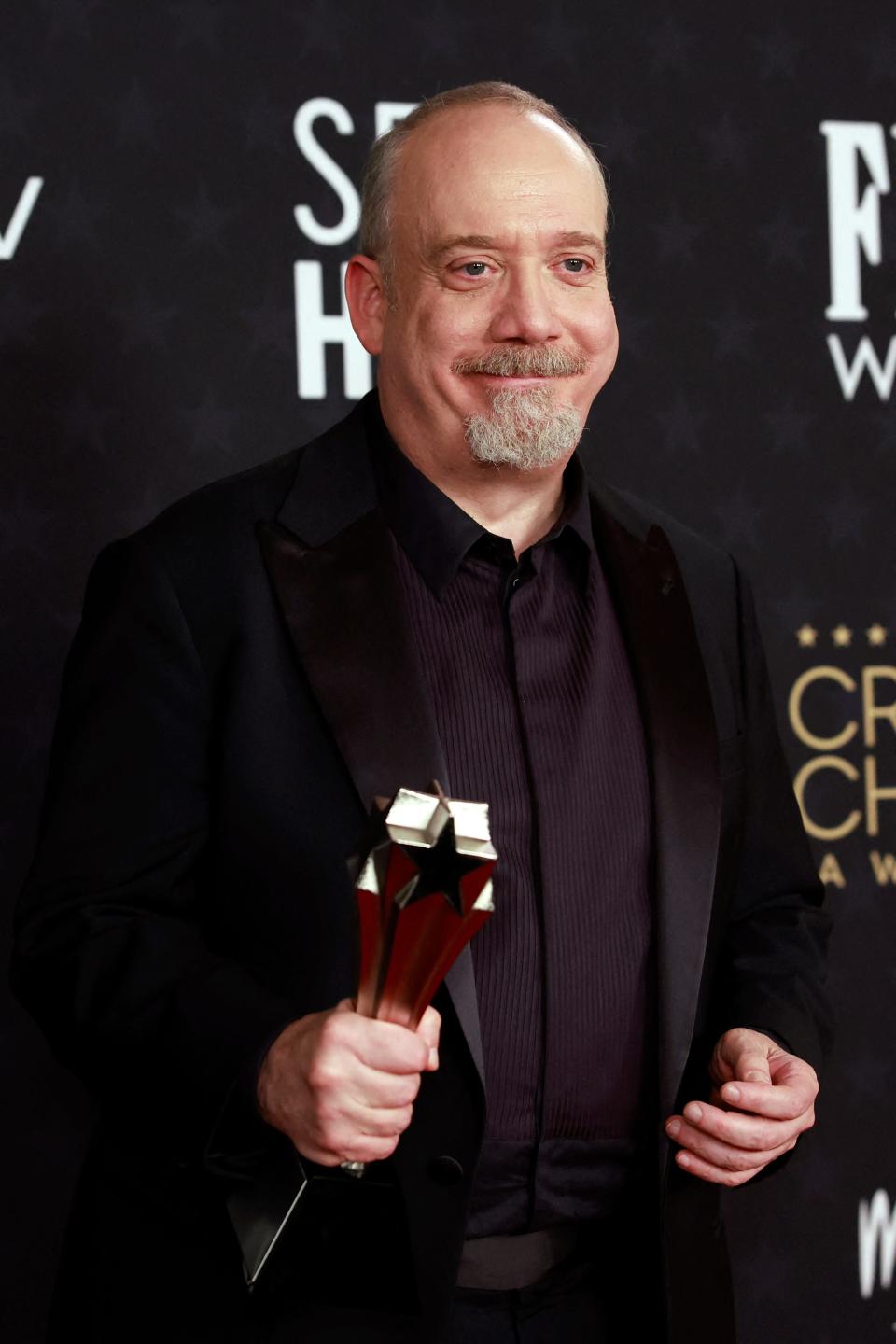 Paul Giamatti, winner of the Best Actor award for "The Holdovers," poses in the press room during the 29th Annual Critics Choice Awards at the Barker Hangar in Santa Monica, California.