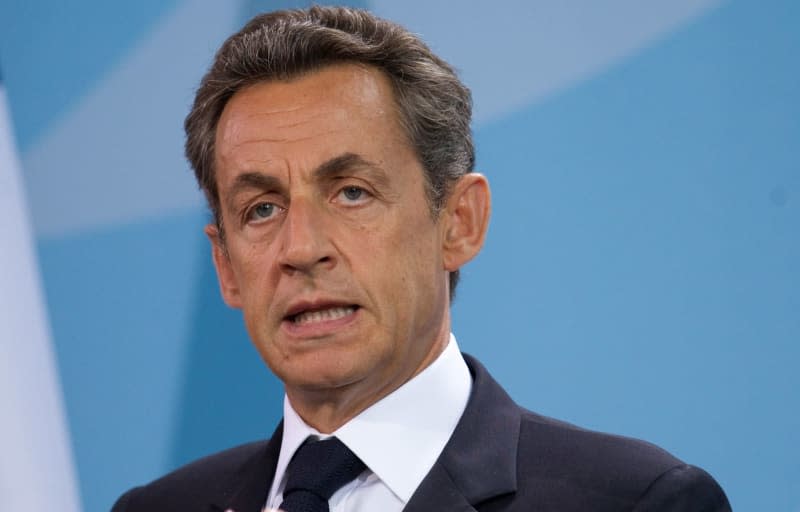 Nicolas Sarkozy, then French President, speaks at a press conference in the Chancellery in Berlin. Sarkozy is due to learn the outcome on Wednesday of an appeal of his one-year sentence for illegal campaign financing in his failed 2012 re-election bid. Michael Kappeler/dpa