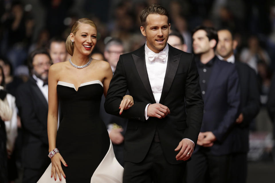 Actor Ryan Reynolds and his wife Blake Lively arrive for the screening of Captives at the 67th international film festival, Cannes, southern France, Friday, May 16, 2014. (AP Photo/Thibault Camus)