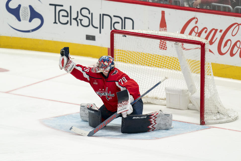 Washington Capitals goaltender Charlie Lindgren makes a save during the third period of an NHL hockey game against the New York Rangers, Saturday, Dec. 9, 2023, in Washington. (AP Photo/Stephanie Scarbrough)