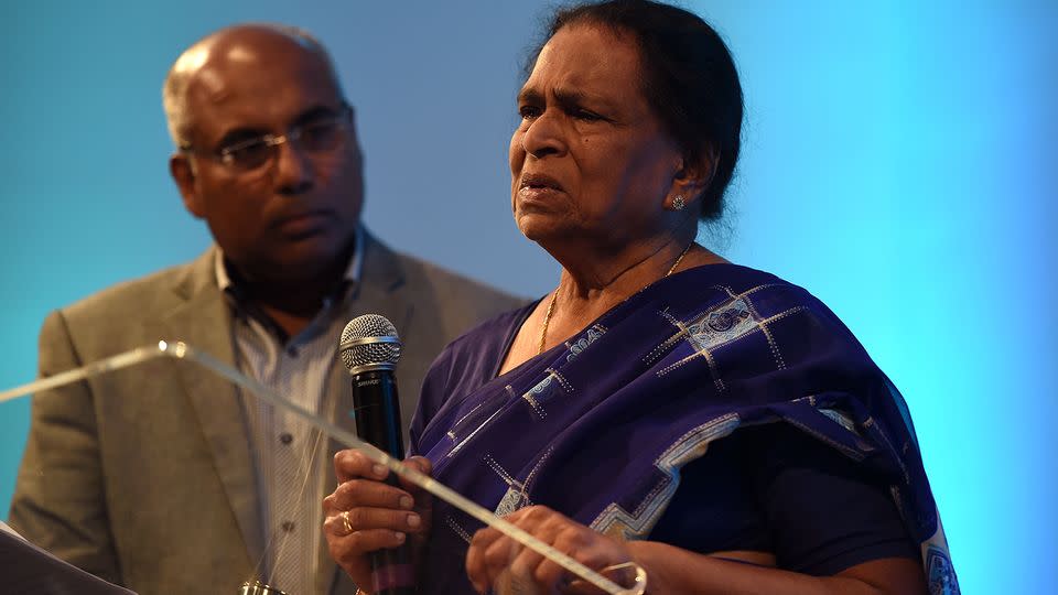 Edith Visvanathan (right), the grandmother of Myuran Sukumaran, is accompanied by Pastor Mithran Chellappah as she speaks at the Ampuni Mercy vigil for Sukumaran and Andrew Chan at the C3 church in Sydney. Source: AAP