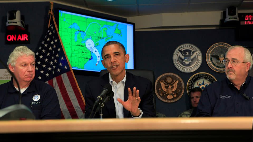 President Barack Obama makes a statement after a briefing on Hurricane Sandy with FEMA Deputy Administrator Richard Serino, left, and FEMA Administrator Craig Fugate at FEMA Headquarters on October 28, 2012, in Washington, DC. - Dennis Brack-Pool/Getty Images