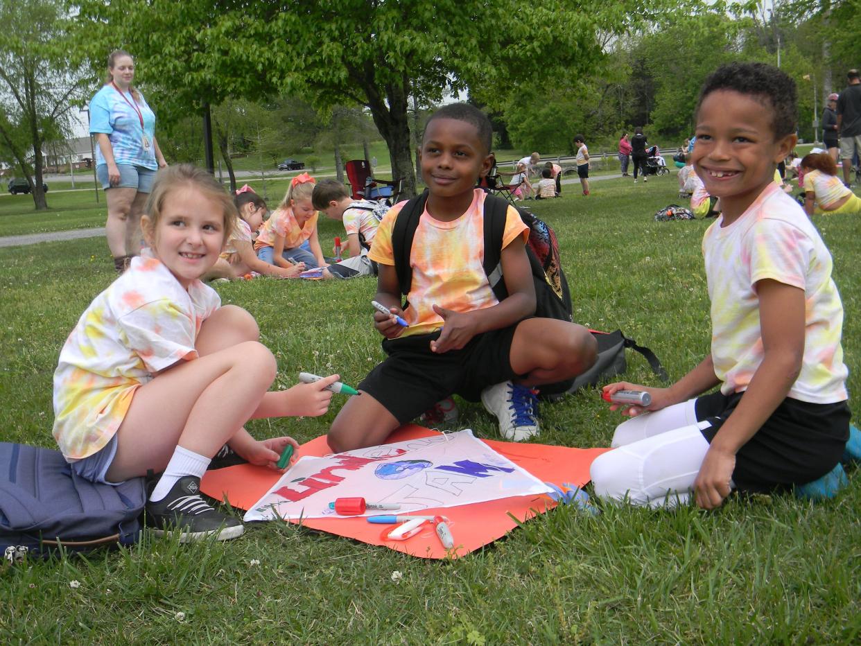 Linden Elementary School students work on a kite to fly at A.K. Bissell Park.