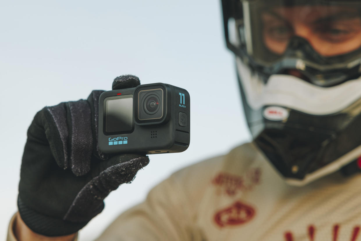  GoPro Hero 11 Black in the hand of a dirt bike rider 