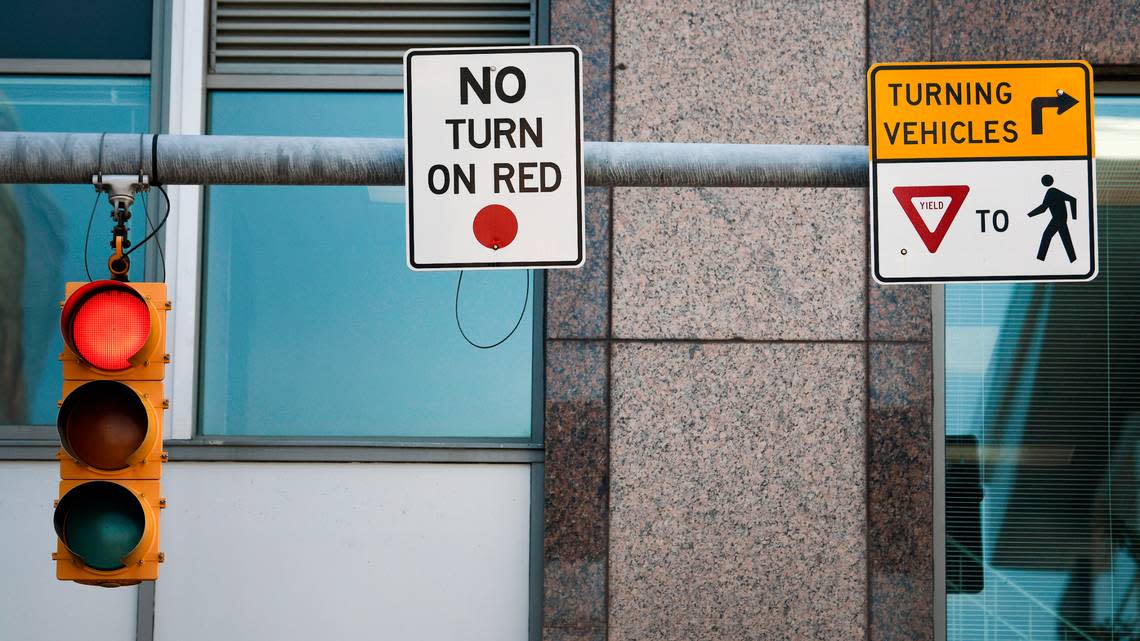 Signs advising drivers that there is no right turn on a red light have appeared in increasing numbers in downtown Raleigh.