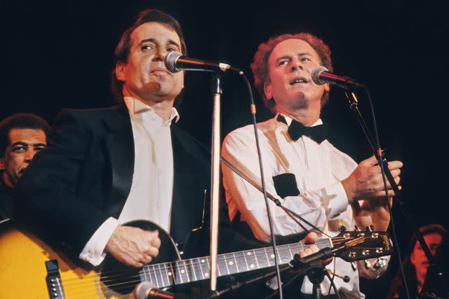 Larry Busacca/Getty Images Paul Simon and Art Garfunkel performing in New York City in January 1990