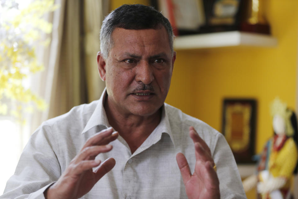 Birod Khatiwada, a central member of the Nepal Communist Party speaks during an interview with the Associated press in Kathmandu, Nepal, Monday, July 6, 2020. Nepal’s prime minister could be forced out of office within weeks amid an internal tussle for power within his governing party following his sharp rhetoric on neighboring India and as Chinese influence grows in Nepal. (AP Photo/Niranjan Shrestha)