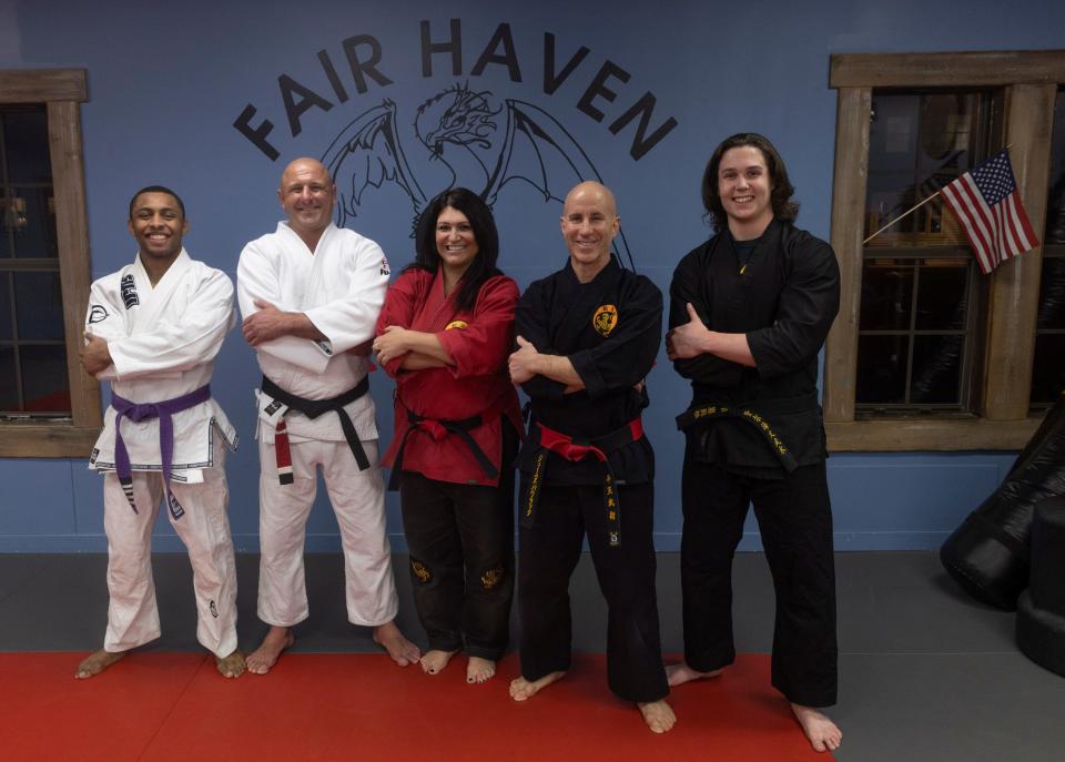 (Left to right) Chris Albert, Jason David Tabor, Diana Kellenbence, Jim Pawlak and Marcel Tretina at Fair Haven Martial Arts in Fair Haven, which provides martial arts and fitness training for its customers. Wednesday, Feb. 1, 2023