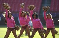 <p>Washington Redskins cheerleaders perform before an NFL football game between the Redskins and the Philadelphia Eagles, Sunday, Oct. 16, 2016, in Landover, Md. (AP Photo/Nick Wass) </p>