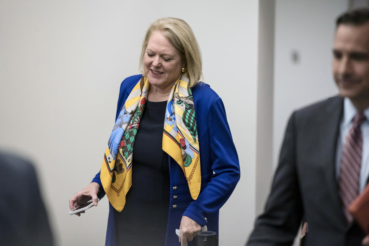 FILE - Conservative activist Virginia "Ginni" Thomas, the wife of Supreme Court Justice Clarence Thomas, walks to a room at the O'Neill House Office Building, part of the Capitol complex, where she is being interviewed by the House panel investigating the Jan. 6 insurrection, in Washington, Sept. 29, 2022. The House committee investigating the Jan. 6 attack on the U.S. Capitol has scheduled its next hearing for Oct. 13, pushing the investigation back into the limelight less than three weeks before the midterm election that will determine control of Congress. (AP Photo/J. Scott Applewhite, File)