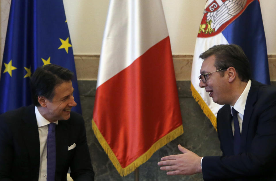 Italian Prime Minister Giuseppe Conte, left, speaks with Serbian President Aleksandar Vucic in Belgrade, Serbia, Wednesday, March 6, 2019. Conte is on a one-day official visit to Serbia. (AP Photo/Darko Vojinovic)