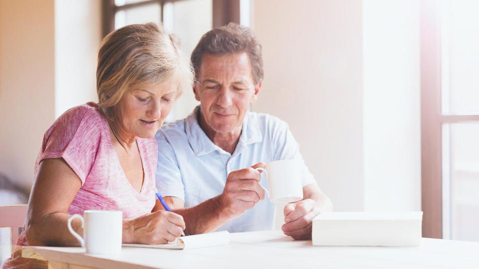 couple having coffee and discussing retirement planning