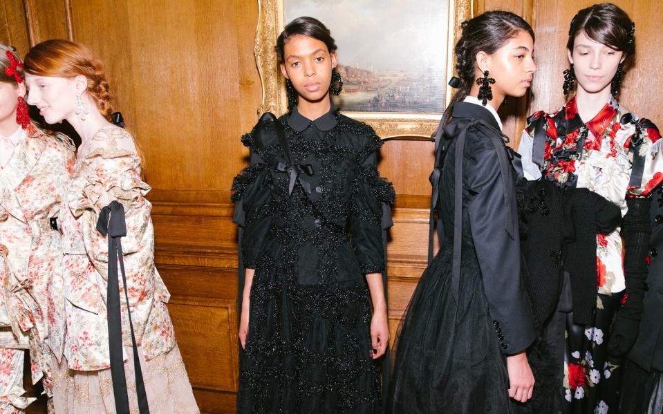 Today in London, models at Simone Rocha's Fall 2018 show wore a bevy of braids and bows that were equal parts pretty and irreverent.