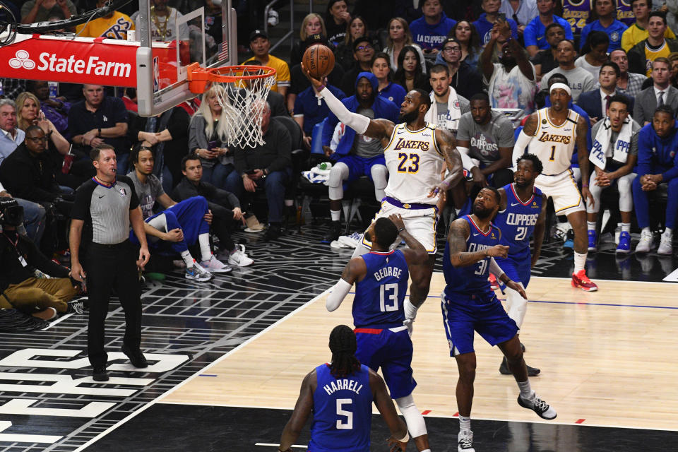 LOS ANGELES, CA - MARCH 08: Los Angeles Lakers Forward LeBron James (23) drives to the basket during a NBA game between the Los Angeles Lakers and the Los Angeles Clippers on March 8, 2020 at STAPLES Center in Los Angeles, CA. (Photo by Brian Rothmuller/Icon Sportswire via Getty Images)