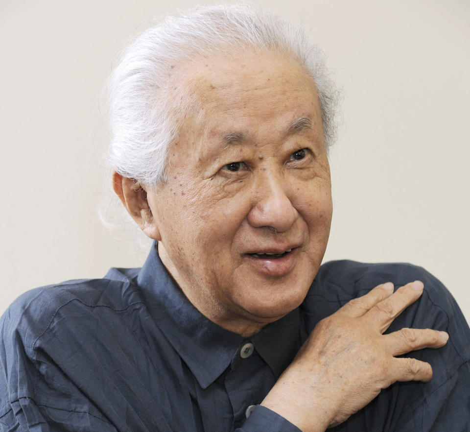 In this photo taken in 2013, architect Arata Isozaki is interviewed. Isozaki, credited with bringing together the East and West in his innovative designs, has been awarded this year’s Pritzker Architecture Prize, known internationally as the highest honor in the field. The 2019 prize was announced Tuesday, March 5, 2019. (Kyodo News via AP)